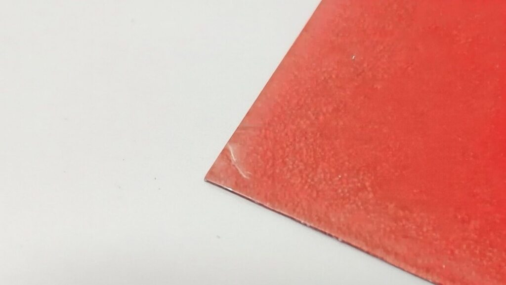 スリーブの角に丸く”折れ”ができてしまっている状態